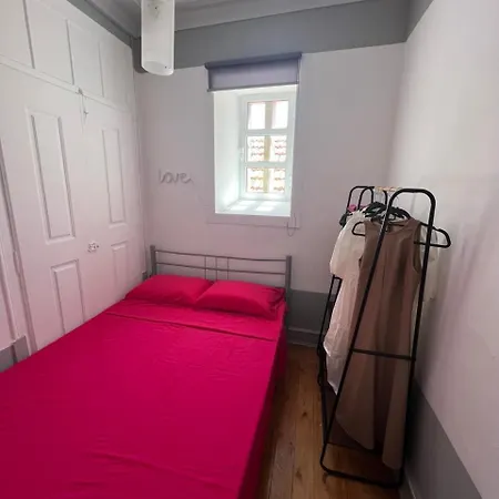 Quarto em Acomodações Particulares Cozy In The Center