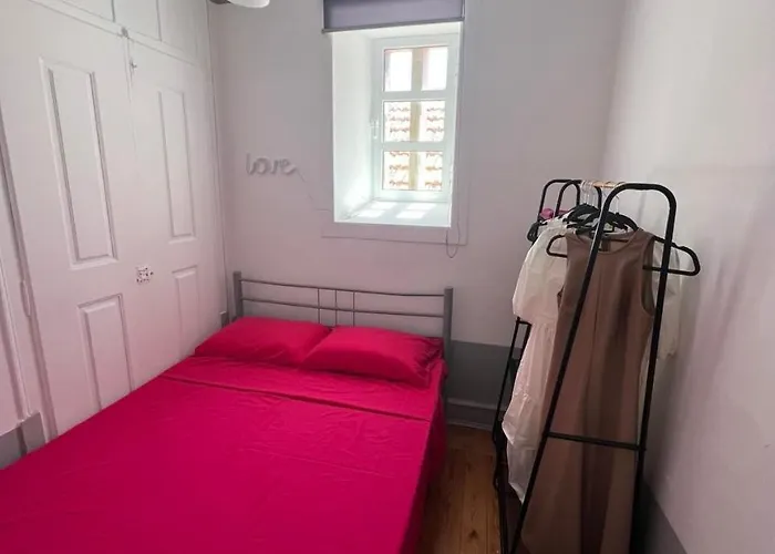 Quarto em Acomodações Particulares Cozy In The Center